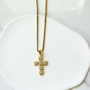 "Gold Cross”